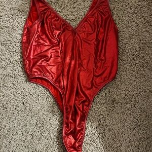 Red bodysuit.